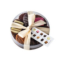 assorted belgian chocolates in 10cm cello round with ribbon